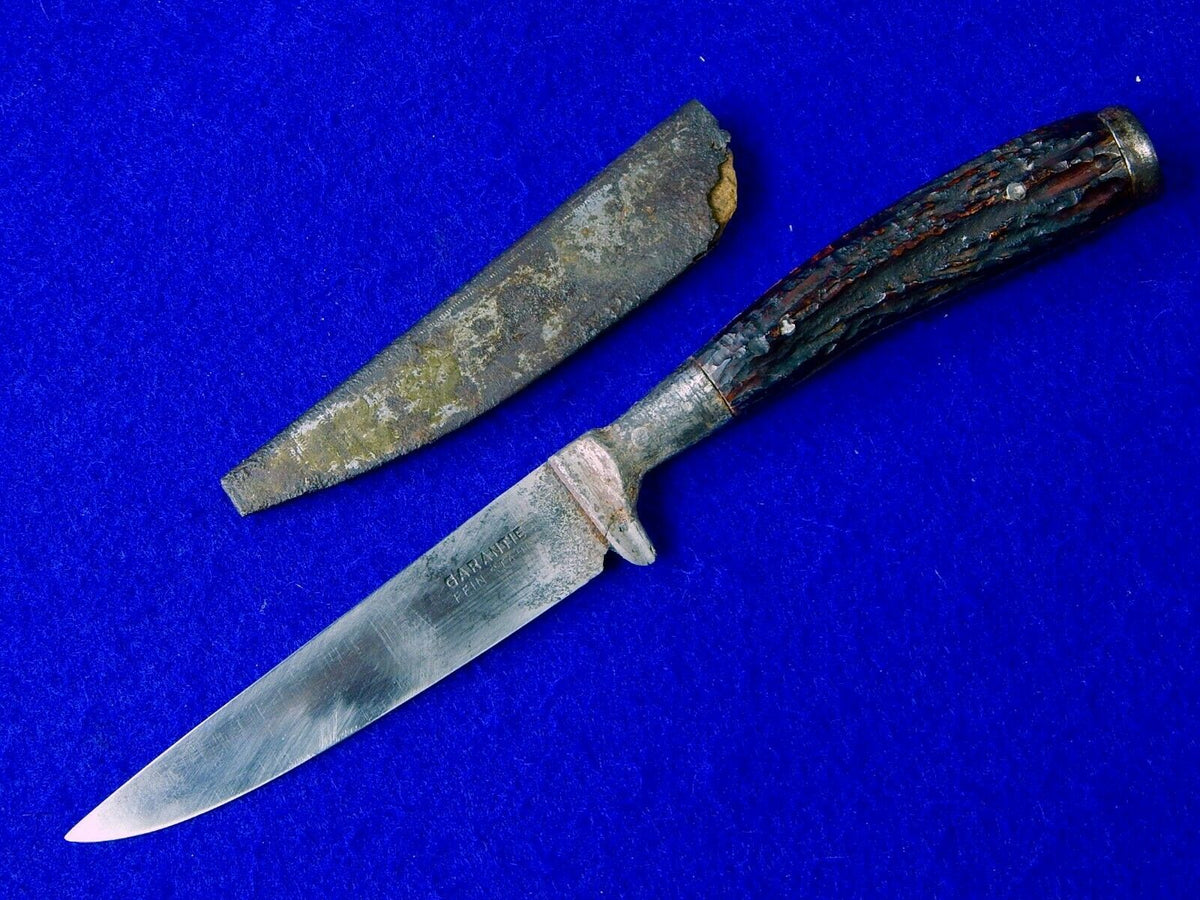 http://www.blackswanantique.com/cdn/shop/products/boot-knife_ww1-knife_germany-ww1_fighting-knives_rare-knives_antique-knives_German-knife_Garantie-Fein-Stah_antique_RARE_German_Germany_WWI_WW1_Garantie_Fein-Stahl_Boot_Fighting_Knife_f1728543-a6b3-4741-a829-b5d69efb35c5_1200x1200.jpg?v=1559661246