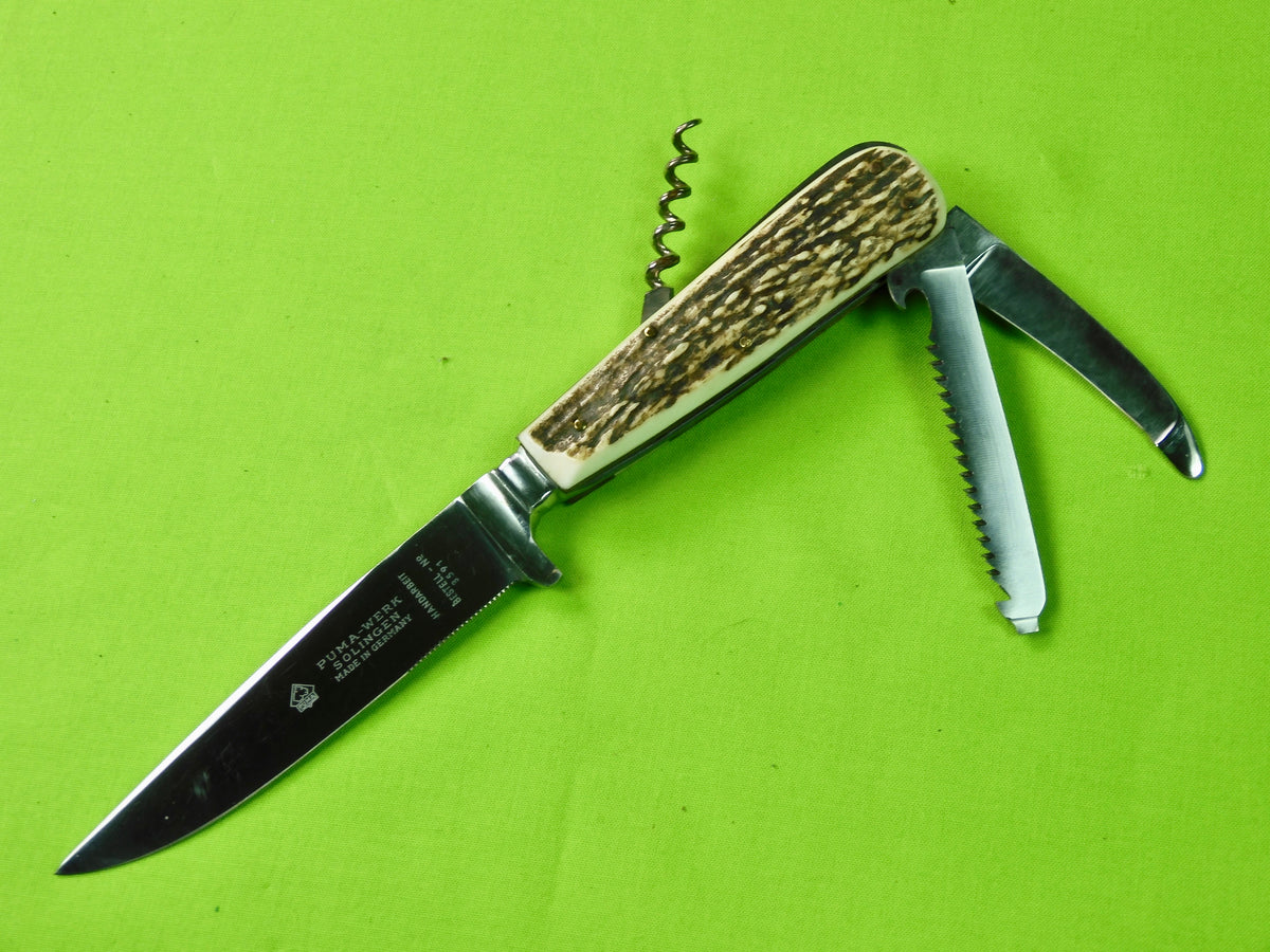 http://www.blackswanantique.com/cdn/shop/products/puma_puma-knife_knives_gernam-knife_Vintage_German_Germany_Puma-Werk_Solingen_Folding_Tools_Hunting_Knife_Sheath_2_1200x1200.jpg?v=1640031191