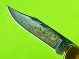 2001 Buck 110 Custom Limited Gold Etched Big Bucks North America Folding Knife
