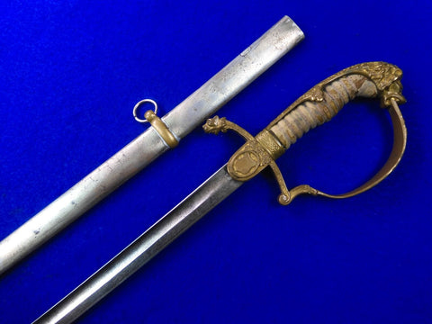 Original Turkish WW1 Engraved Officer's Sword with Scabbard  The hilt is a bit loose  33 1/4" total length  The blade is 28"