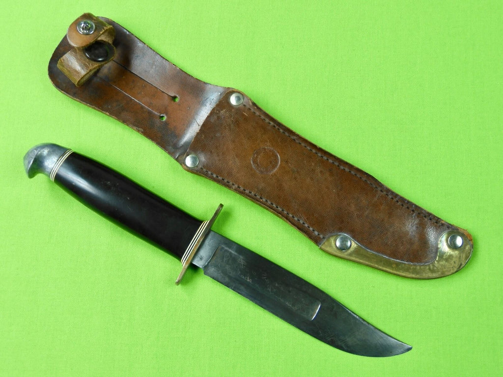 https://www.blackswanantique.com/cdn/shop/products/finnish-knife_knives_fighting-knife_Vintage_Old_Finnish_Finland_Fighting_Knife_Sheath_22_1024x1024.jpg?v=1620738634